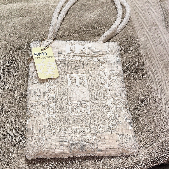 Elegant White/Antique whiteSparkly Wristlet with Textured Fabric - Picture 1 of 4